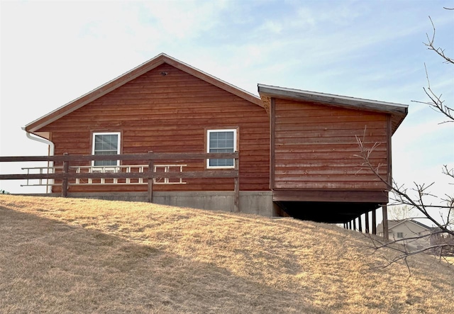 view of home's exterior featuring a lawn