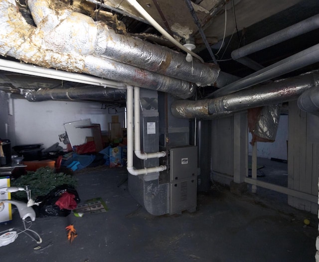 basement featuring heating unit