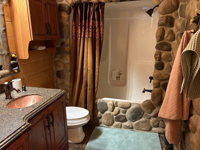 full bathroom featuring vanity and toilet