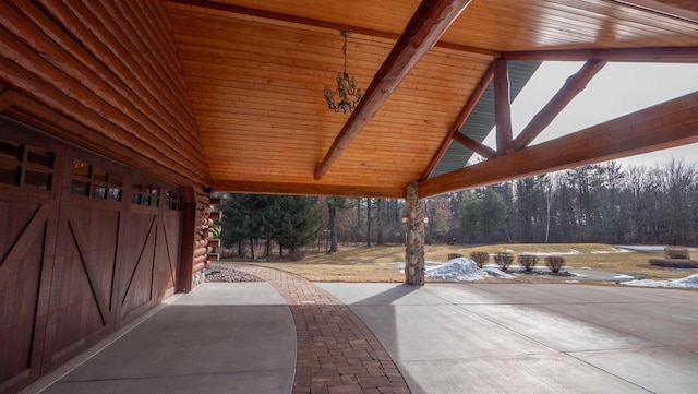 view of patio with a view of trees