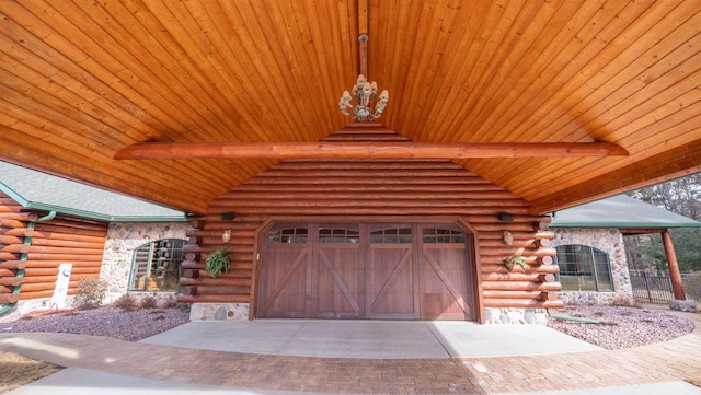 view of front of house featuring log siding