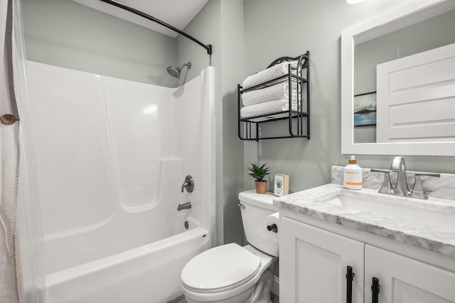 full bathroom featuring shower / bathtub combination, vanity, and toilet