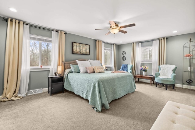 bedroom featuring carpet floors, recessed lighting, visible vents, and baseboards