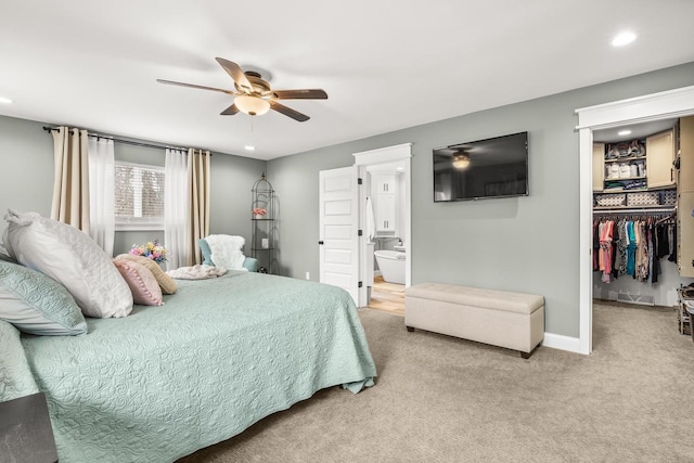 bedroom with recessed lighting, a spacious closet, a ceiling fan, carpet flooring, and baseboards