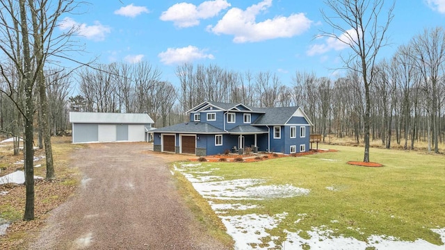 view of front of property featuring dirt driveway, a front lawn, a porch, and an outdoor structure