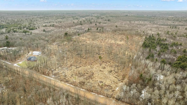 birds eye view of property featuring a rural view