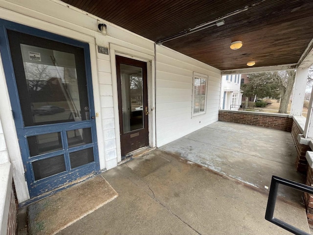 entrance to property with a porch