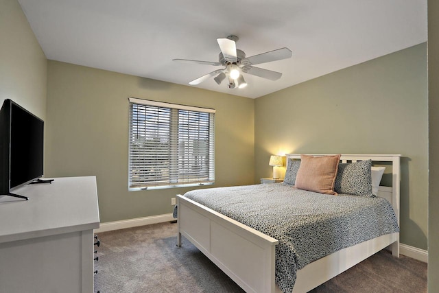 bedroom featuring ceiling fan, carpet flooring, and baseboards