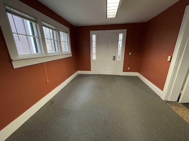 entrance foyer featuring baseboards