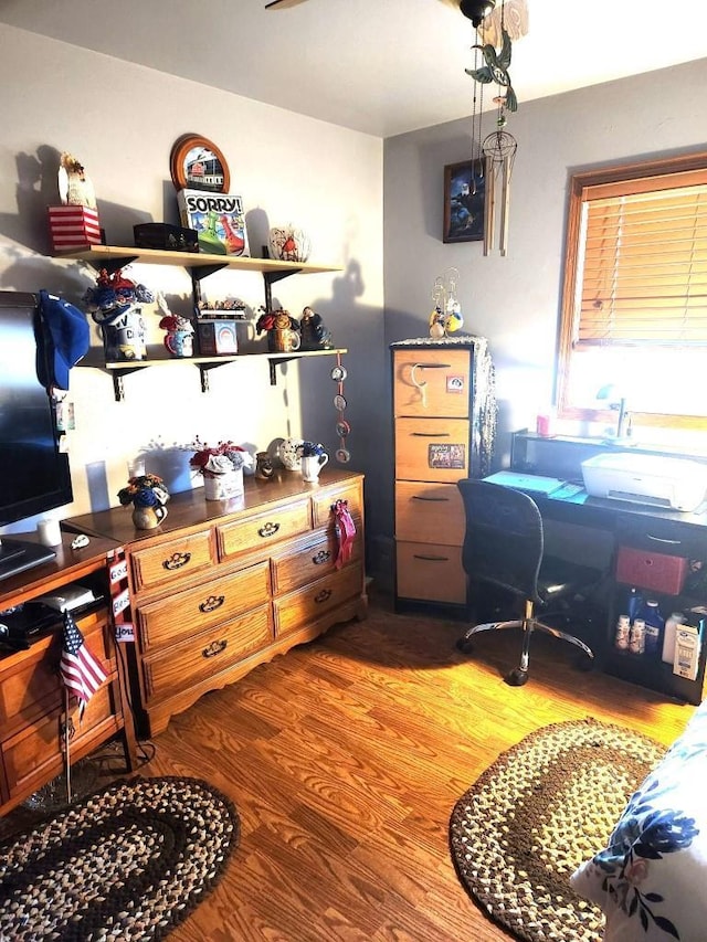 office space with wood finished floors