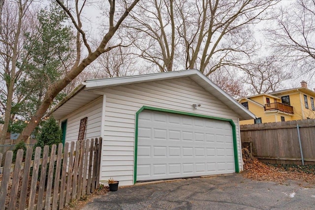 detached garage with fence