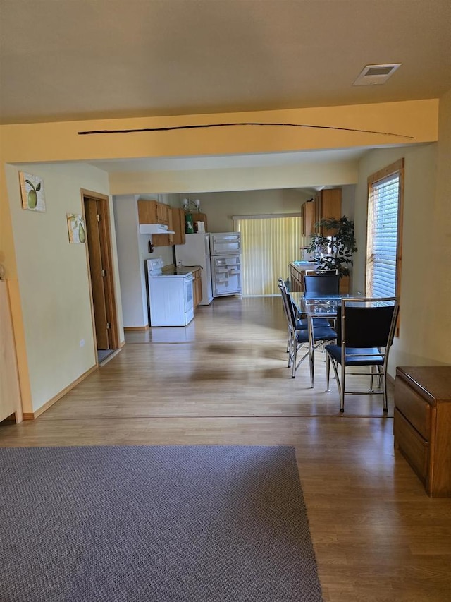 2838 W 3rd Dr, Oxford, WI 53952 - dining room featuring wood finished floors and baseboards