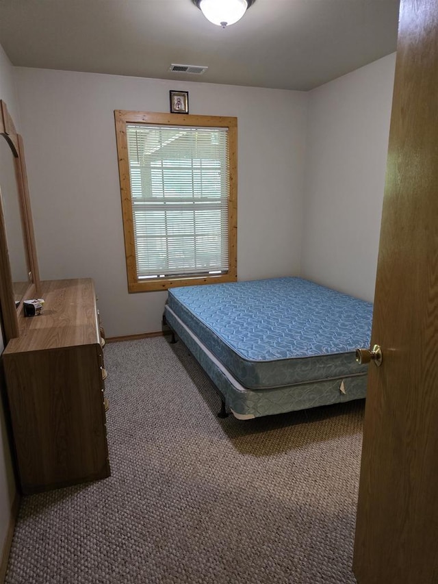2838 W 3rd Dr, Oxford, WI 53952 - carpeted bedroom featuring baseboards