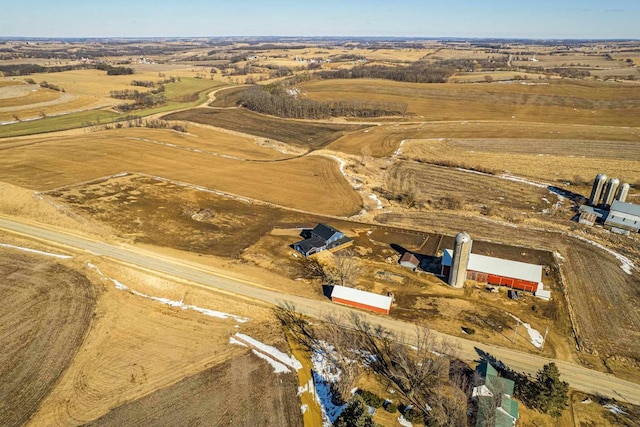 birds eye view of property featuring a rural view