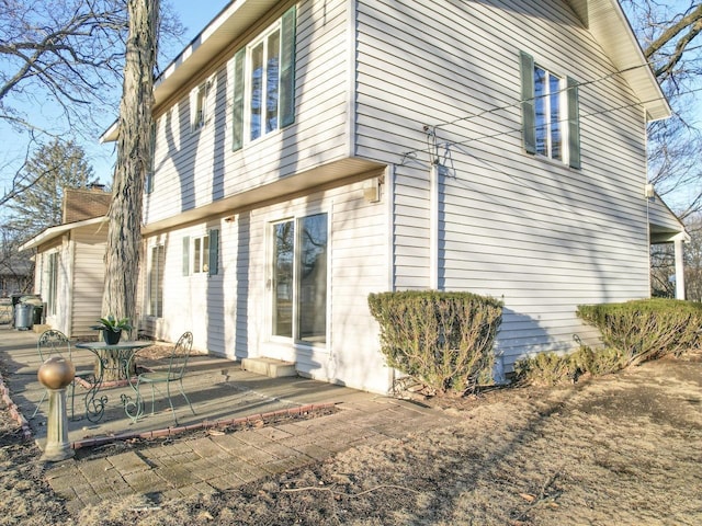 rear view of house featuring a patio area