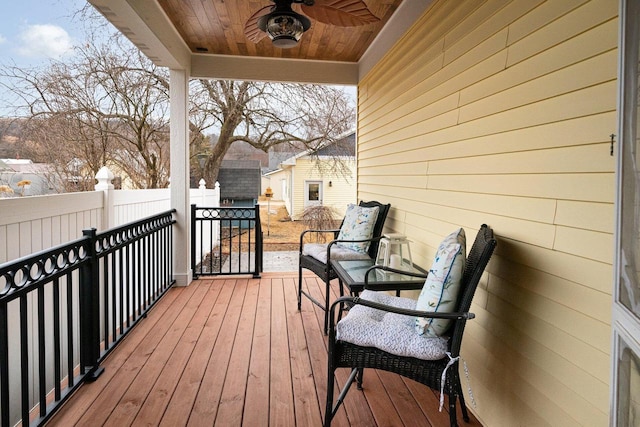 balcony featuring ceiling fan