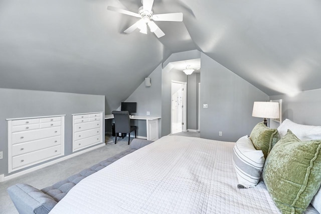 carpeted bedroom with lofted ceiling and a ceiling fan