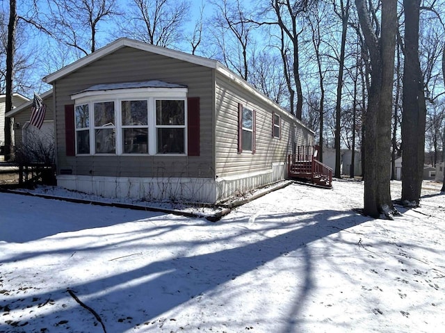 view of snow covered property