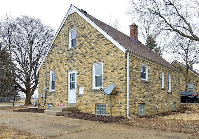 view of front of property with a chimney