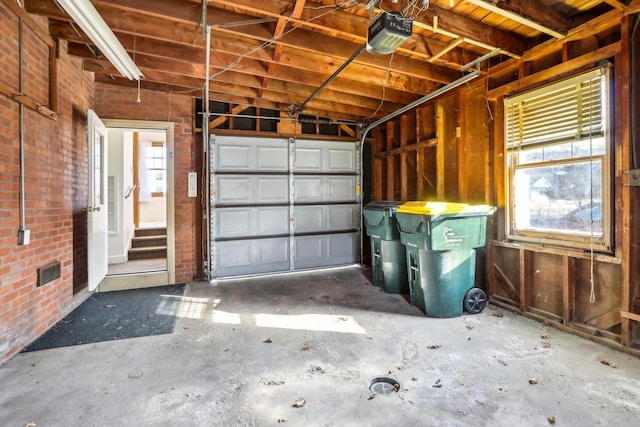 garage featuring a garage door opener