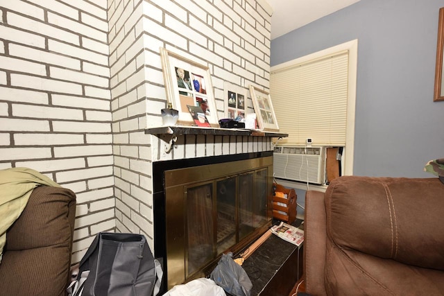 interior space featuring a glass covered fireplace