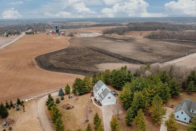 birds eye view of property featuring a rural view