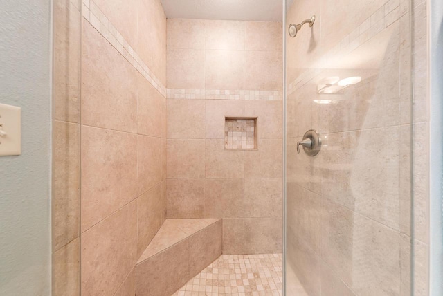 bathroom featuring a stall shower