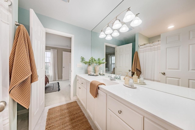 bathroom with vanity and tile patterned floors