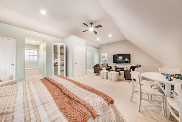 bedroom featuring recessed lighting, light carpet, a ceiling fan, baseboards, and vaulted ceiling