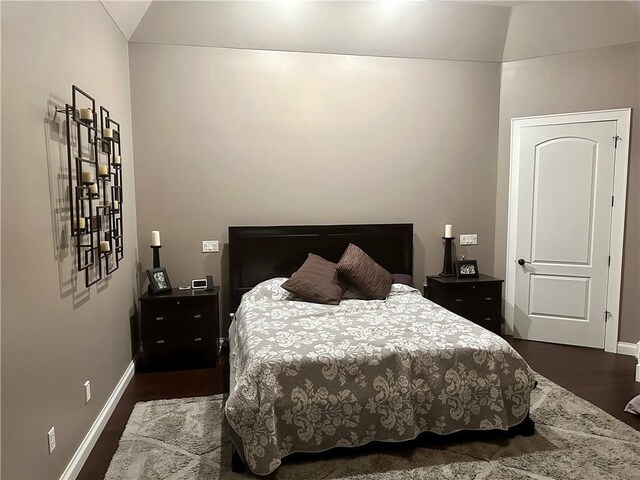 1747 E Drinkman Ln, Eau Claire, WI 54701 - bedroom with baseboards and dark wood finished floors