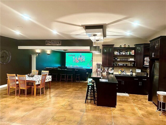 1747 E Drinkman Ln, Eau Claire, WI 54701 - bar featuring freestanding refrigerator
