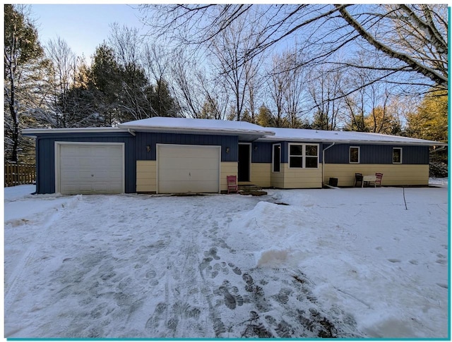 view of front of property featuring an attached garage