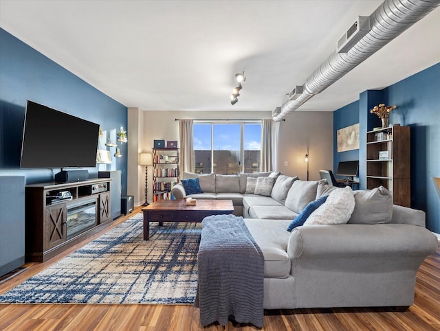 living room with wood finished floors