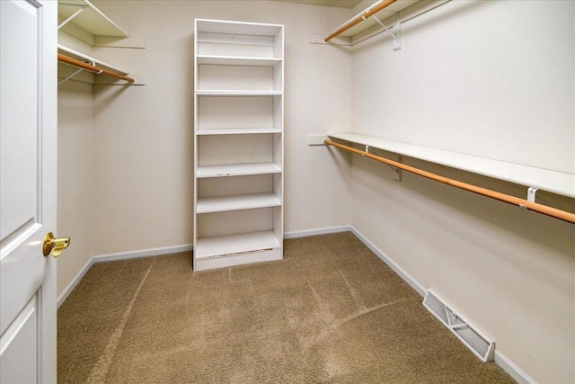 walk in closet with carpet flooring and visible vents