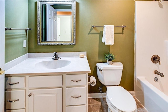 bathroom with toilet, bathing tub / shower combination, and vanity