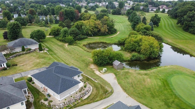 aerial view featuring view of golf course and a water view