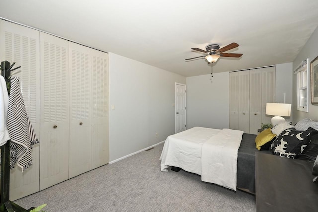 bedroom featuring a closet, carpet flooring, baseboards, and a ceiling fan