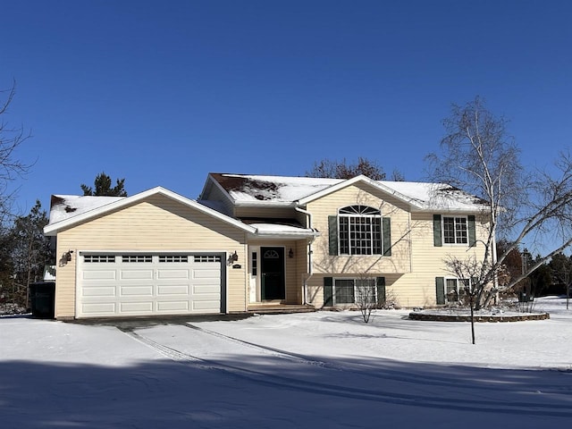 tri-level home featuring a garage