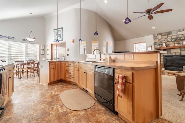 kitchen with dishwasher, open floor plan, decorative light fixtures, light brown cabinetry, and a sink