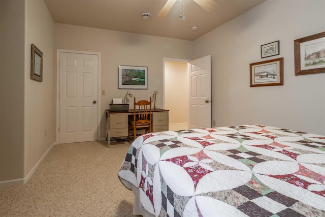 bedroom with ceiling fan and baseboards