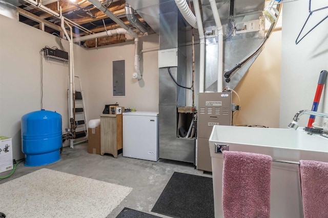 utility room featuring electric panel