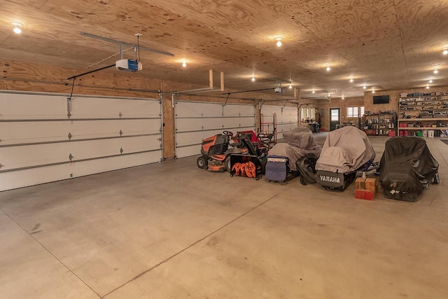 garage featuring a garage door opener