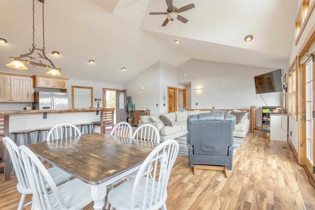 W5611 32nd St, New Lisbon, WI 53950 - dining area featuring lofted ceiling, light wood-type flooring, and a ceiling fan