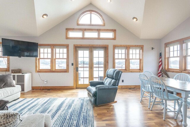 W5611 32nd St, New Lisbon, WI 53950 - living room with high vaulted ceiling, recessed lighting, light wood-style flooring, and baseboards