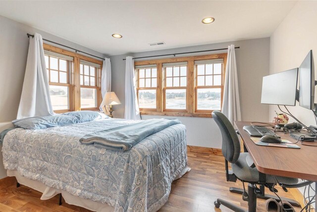 W5611 32nd St, New Lisbon, WI 53950 - bedroom featuring light wood-style flooring, visible vents, and recessed lighting