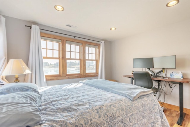 W5611 32nd St, New Lisbon, WI 53950 - bedroom featuring visible vents, wood finished floors, and recessed lighting