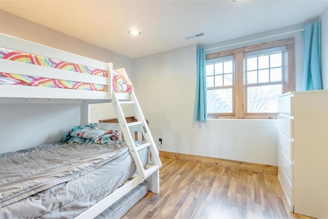 W5611 32nd St, New Lisbon, WI 53950 - bedroom with recessed lighting, visible vents, and wood finished floors