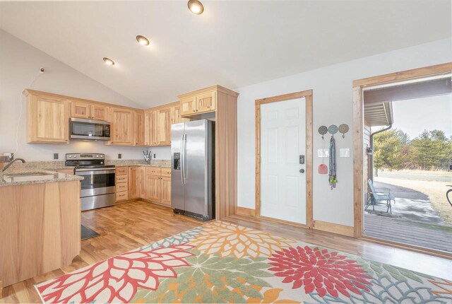 W5611 32nd St, New Lisbon, WI 53950 - kitchen featuring stainless steel appliances, light brown cabinets, and a sink