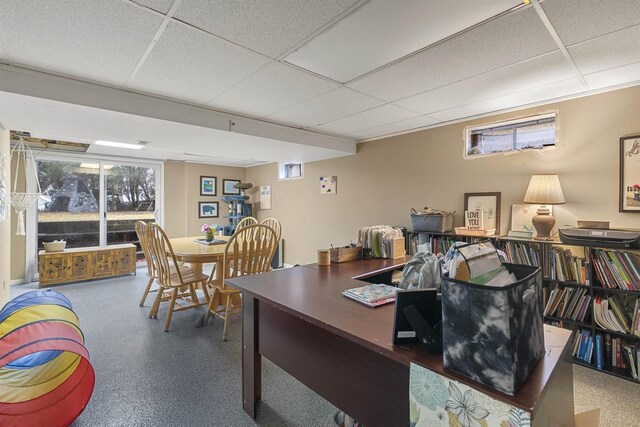 office space with a drop ceiling