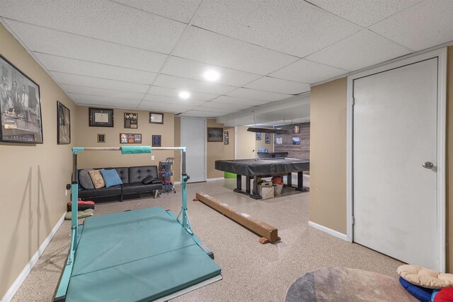 playroom featuring pool table, a paneled ceiling, and baseboards